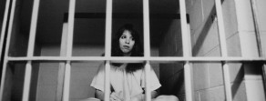 woman behind bars